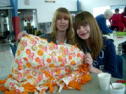 Me and my mom with the blanket we made.